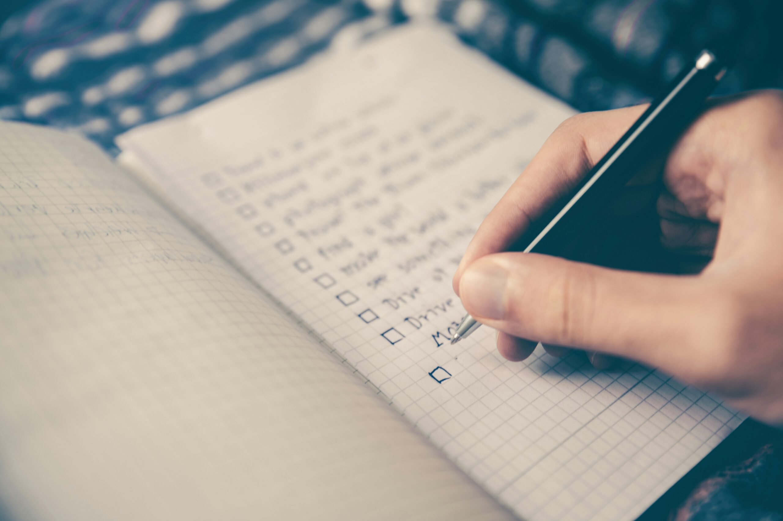person writing list